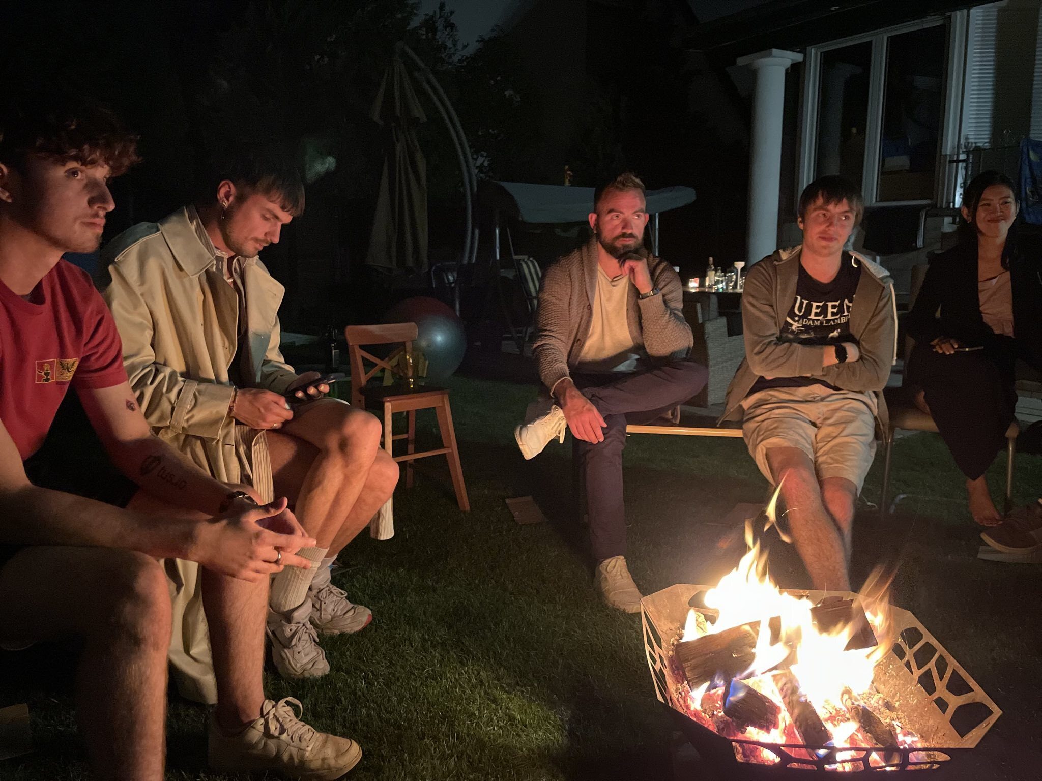 The team around the fire having some discussions about the future of Transloadit.